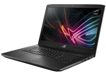 O ASUS ROG Strix Scar Edition distingue-se imediatamente pelo acabamento premium em alumínio preto e logótipo ROG iluminado a vermelho.