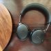 Auscultadores Bose QuietComfort Ultra 2 em preto sobre um fundo neutro.
