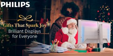 Monitores Philips Evnia e Philips E-line em ambiente festivo de Natal