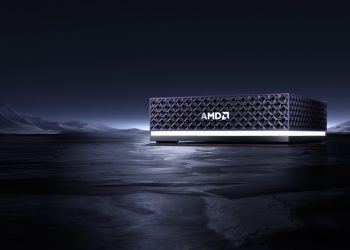 AMD Ryzen AI Halo mini-PC com processador Ryzen AI Max+ sobre secretária de trabalho com ecrã a mostrar interface de modelo de linguagem local