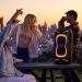 Colunas JBL PartyBox 330 e JBL PartyBox 130 com iluminação RGB dinâmica e design portátil para festas e eventos.