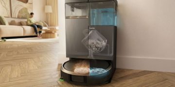 Robot aspirador inteligente iRobot Roomba Combo 415 Plus com base AutoWash em ambiente doméstico moderno